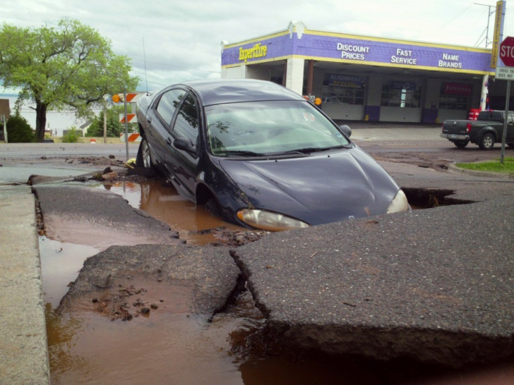 A car trapped in a sink Hole