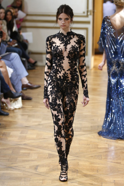 Model in a black lace-and-sequined Zuhair Murad Couture jumpsuit