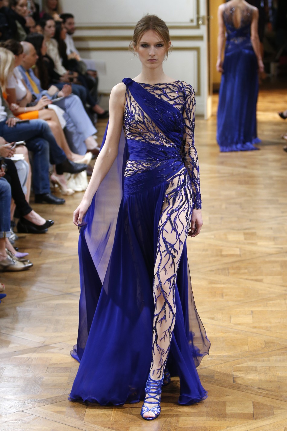 A high-end electric blue evening gown