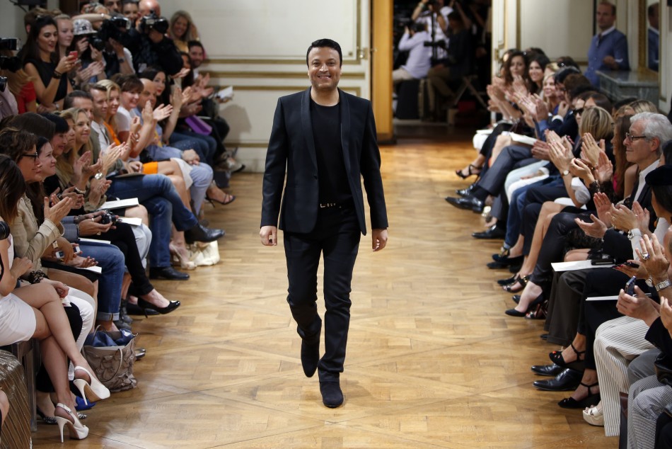 Lebanese designer Zuhair Murad appears at the end of his Haute Couture Fall Winter 20132014 fashion show in Paris July 4, 2013.
