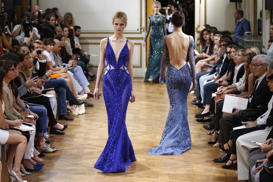Murads stunning collection featured flowing lace gowns, see-though shift dresses and provocative thigh-high splits.