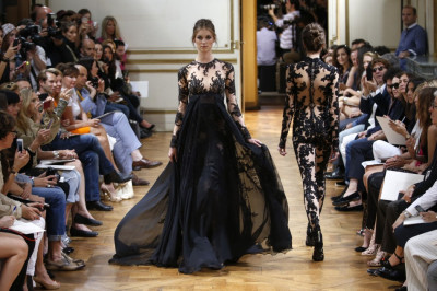 A black gown with lace bustiers