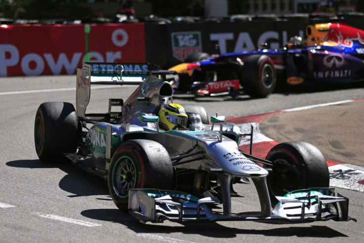 Nico Rosberg [Mercedes F1] (L) and Sebastian Vettel [Red Bull Racing-Renault]