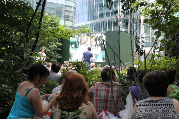 Make for the trees: Fans settle in bushes for view of action from Wimbledon