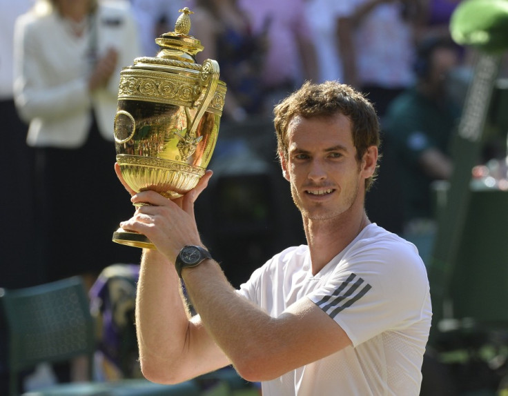 History in the making: Andy Murray clasps Wimbledon trophy