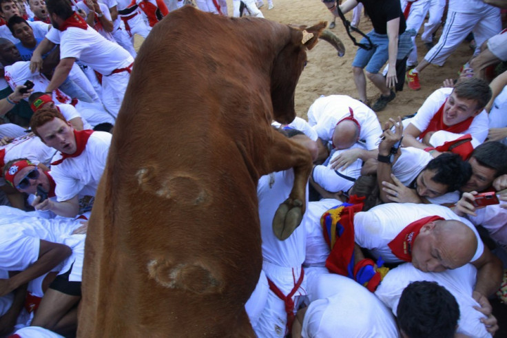 John Bennett, became the first casualty at Pamplona's annual running of the bulls fiesta