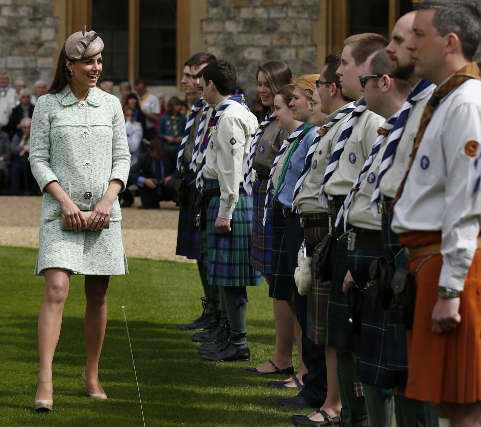 Catherine, Duchess of Cambridge meets scouts during at the National Review of Queens Scouts at Windsor Castle in Berkshire, near London April 21, 2013.