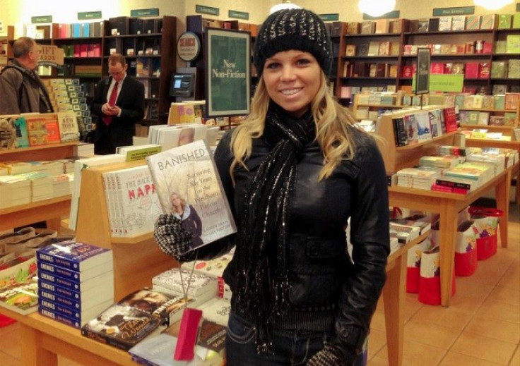 Drain with her book, 'Banished'