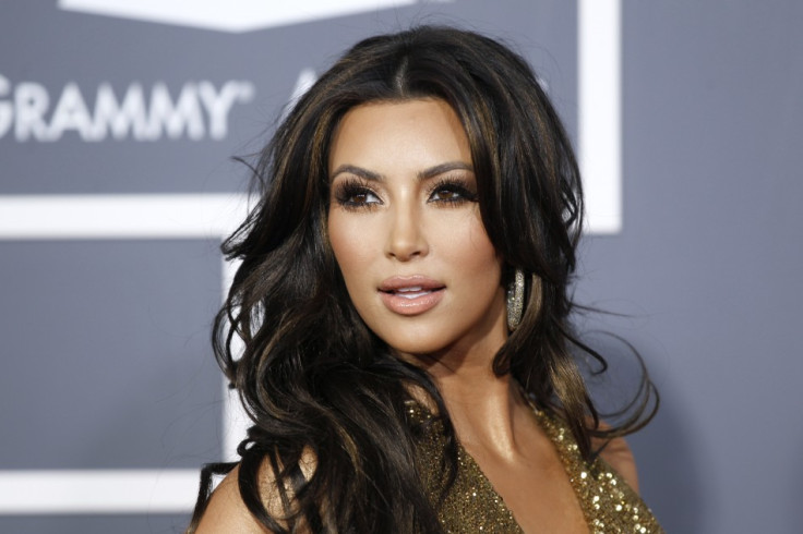 Kim and Kanye take baby North West to 4th of July family party/REUTERS