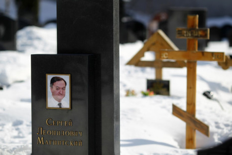 A picture of lawyer Sergei Magnitsky is seen on his grave in the Preobrazhensky cemetery in Moscow
