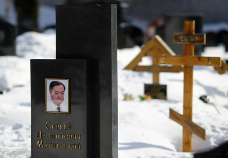 A picture of lawyer Sergei Magnitsky is seen on his grave in the Preobrazhensky cemetery in Moscow