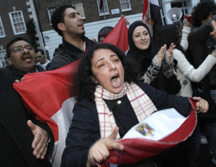 Egyptians and supporters celebrate the resignation of Egypt's President Hosni Mubarak outside the country's embassy in London (Reuters)