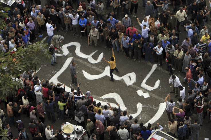 Protesters chant slogans against Egyptian President Mohamed Mursi during a demonstration at Tahrir square in Cairo (Reuters)