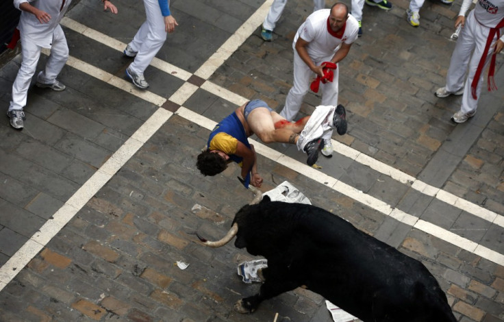 The runner was taken to hospital for his injuries (Reuters)