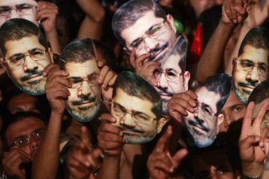 Interim administration launches criminal probe on Morsi