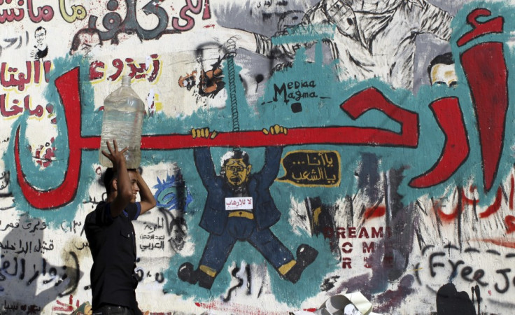 A wall filled with graffiti depicting deposed Egyptian President Mohamed Mursi with a message reading "Leave", at Tahrir Square in Cairo (Photo: Reuters)