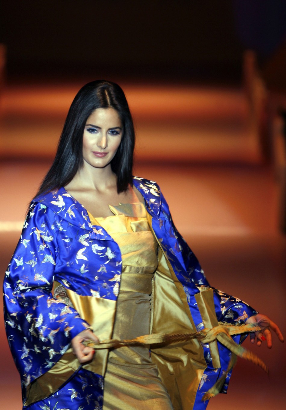 Kaif displays an outfit by Indian designer Narendra Kumar during the grand finale of India fashion week in Mumbai March 31, 2007.
