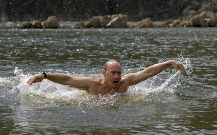 Russia's Prime Minister Vladimir Putin swims in a lake in southern Siberia's Tuva region