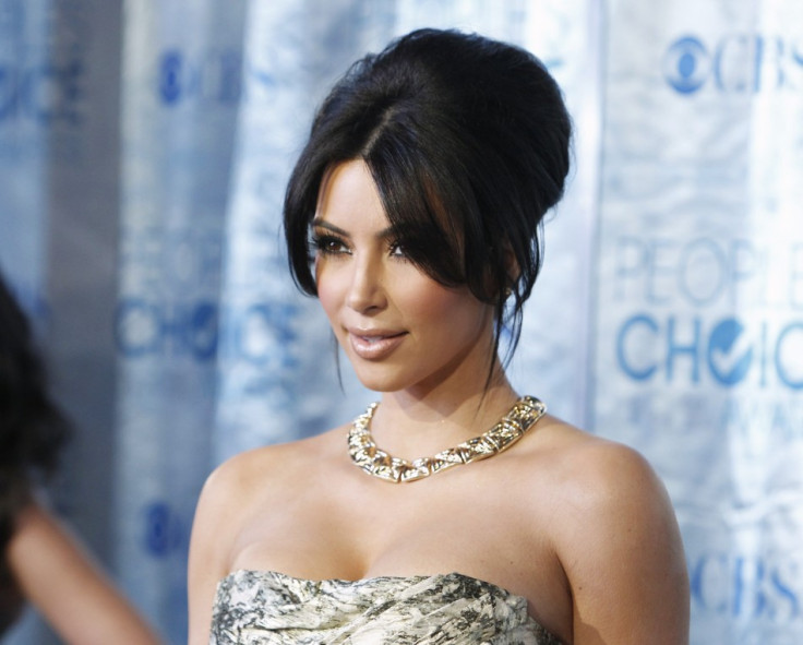 Kim breaks her silence over North West in a blog/Reuters