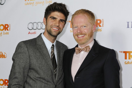 Actor Jesse Tyler Ferguson (R) and his partner Justin Mikita