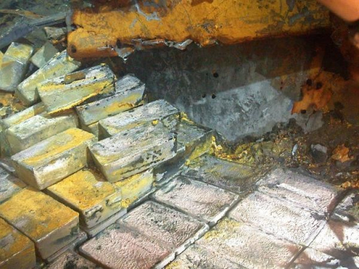 Discovery of buried silver treasure on the SS Gairsoppa. It is the heaviest and deepest recovery of precious metals from a shipwreck. (Odyssey Marine Exploration)