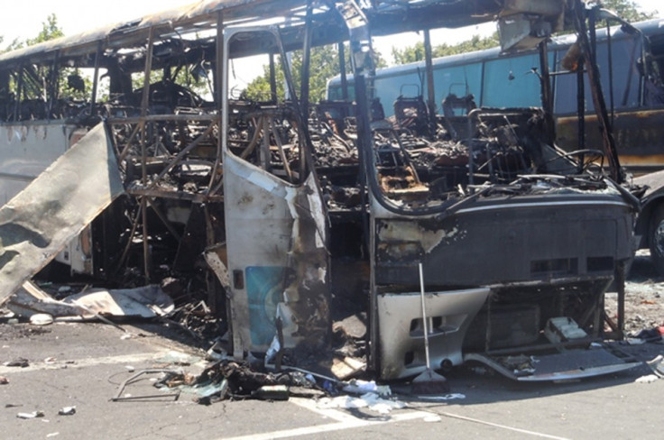 Buses that were damaged in a bomb blast on Wednesday are seen outside Burgas Airport