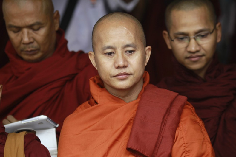Buddhist monk Wirathu (C), leader of the 969 movement, greets other monks