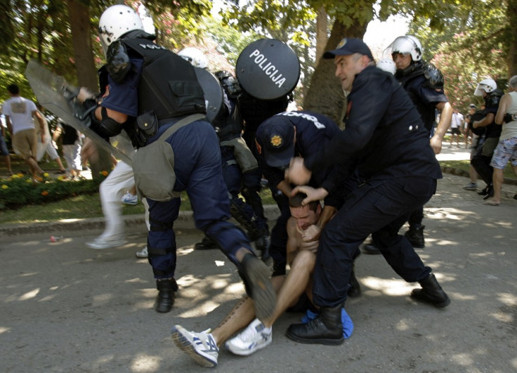 Police detain an anti-gay protestor during a gay pride parade in Budva (Reuters)