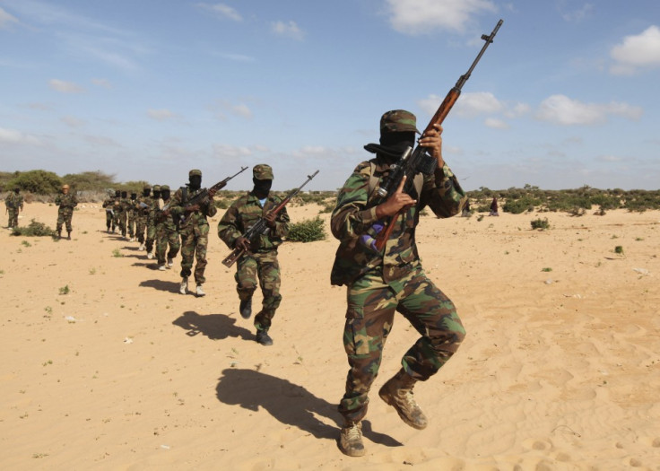 Members of Somalia's Al Shabaab militant group parade during a demonstration