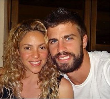 Shakira poses with boyfriend Gerard on a private vacation
