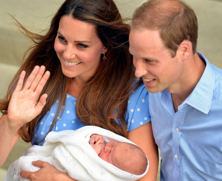 Catherine, Duchess of Cambridge, holds her baby son outside the Lindo Wing of St Mary's Hospital before leaving with Prince William