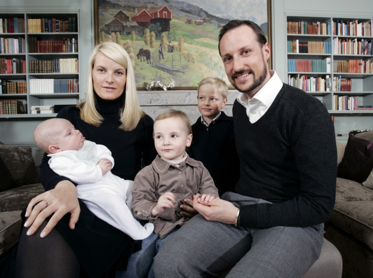Norwegian Crown Prince Haakon and Crown Princess Mette-Marit pose with their family in their home at Skaugum, near Oslo in this March 2006 photo. Picture shows (left to right) the young Prince Sverre Magnus, Crown Princess Mette-Marit, Princess Alexandra,