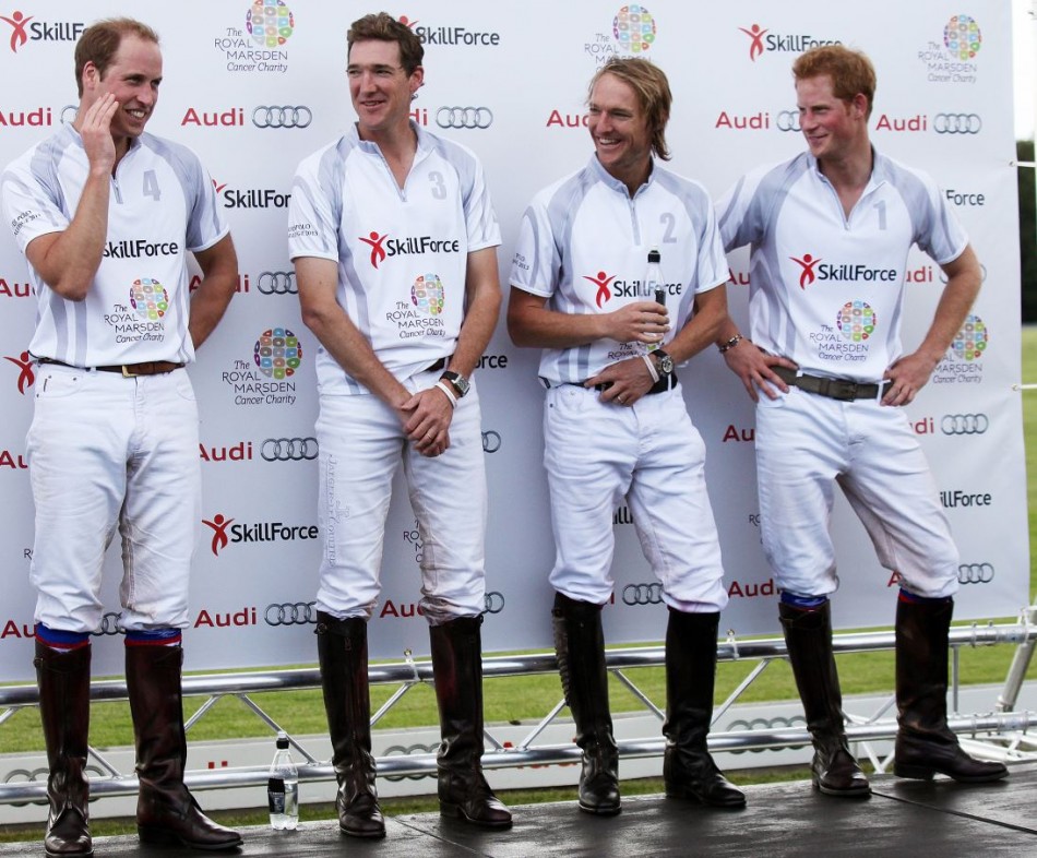 Prince William L and Prince Harry R stand with team-mates Mark Tomlinson 2nd L and Luke Tomlinson after competing in a charity polo match at Coworth Park, southern England August 3, 2013.