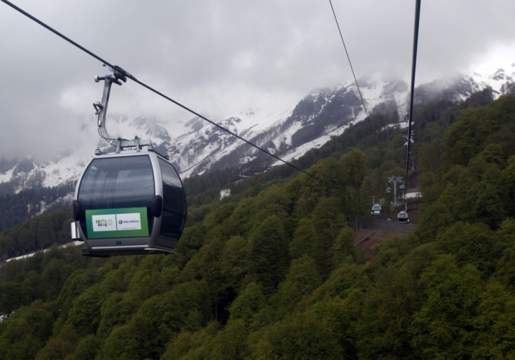 Cable cars above forest