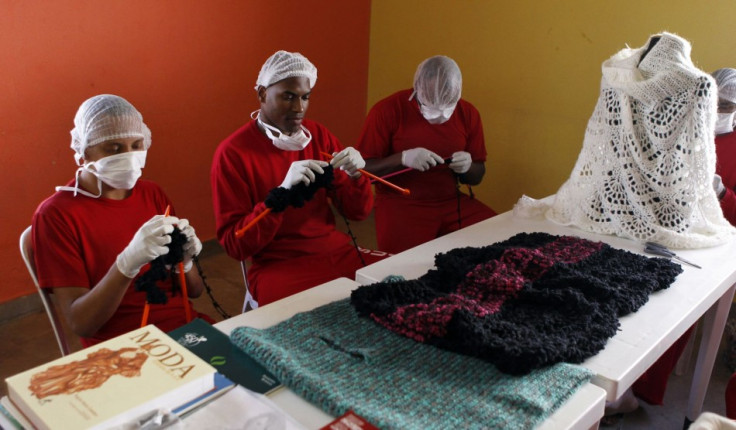Prisoners knit clothing Guimaraes in exchange of pay and reduced sentence. (Photo: REUTERS/Paulo Whitaker)