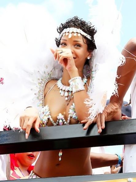 Rihanna on a float during while attending the Barbados Kadooment Day Parade