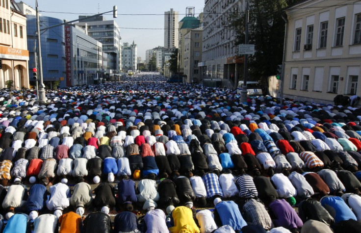 Thousands of believers take part in morning prayers to celebrate the first day of Eid-al-Fitr in Moscow August 8, 2013. (Photo: REUTERS/Sergei Karpukhin)