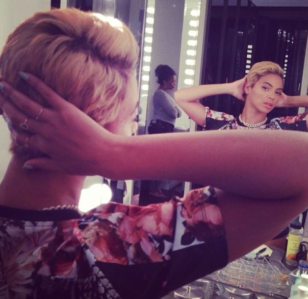 Beyonc posted a photo of herself looking in the mirror, admiring her new pixie cut