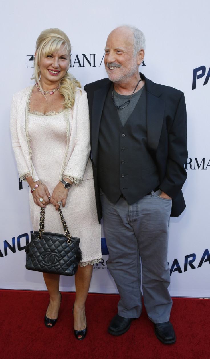 Cast member Richard Dreyfuss and his wife Svetlana Erokhin pose at the premiere of "Paranoia" in Los Angeles, California August 8, 2013.