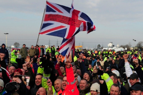 The row over the rise of foreign workers in Britain has rumbled for years. Pictured in 2009, workers protested over the use of foreign workers outside the Total Lindsey refinery in northern England (Photo: Reuters)