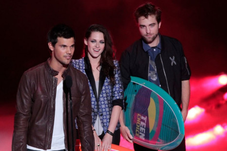Robert Pattinson, Kristen Stewart and Taylor Lautner at the Teen Choice Awards 2012.
