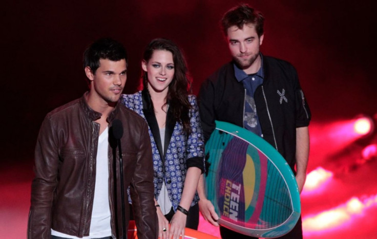 Robert Pattinson, Kristen Stewart and Taylor Lautner at the Teen Choice Awards 2012.