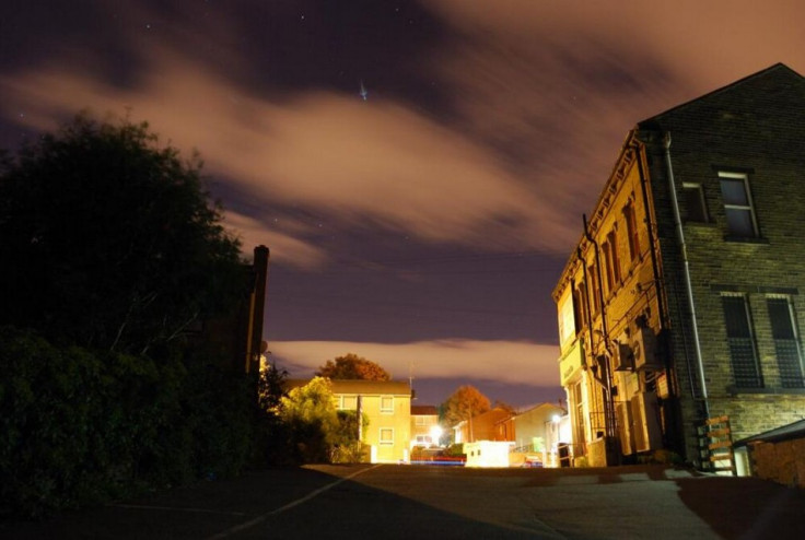 A shooting star is seen in the skies of Birkenshaw village in West Yorkshire on the night of 12 August, when the Perseid meteor shower reached its peak. (Photo: Michael/Twitter)