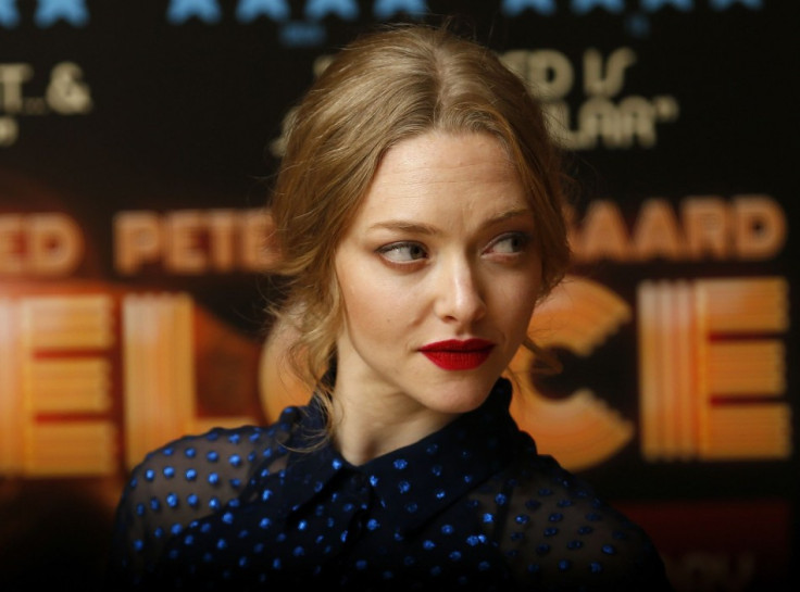 Actress Amanda Seyfried poses for photographers before a screening of her new film Lovelace at a hotel in Mayfair, London August 12, 2013. (Photo: REUTERS/Andrew Winning)