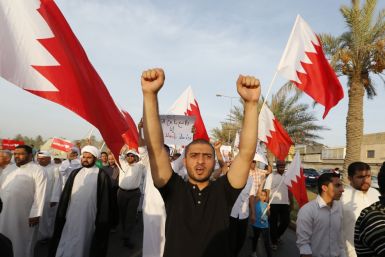 Anti-government demonstrators at a rally organised by Bahrain's main opposition group, Al Wefaq (Reuters)