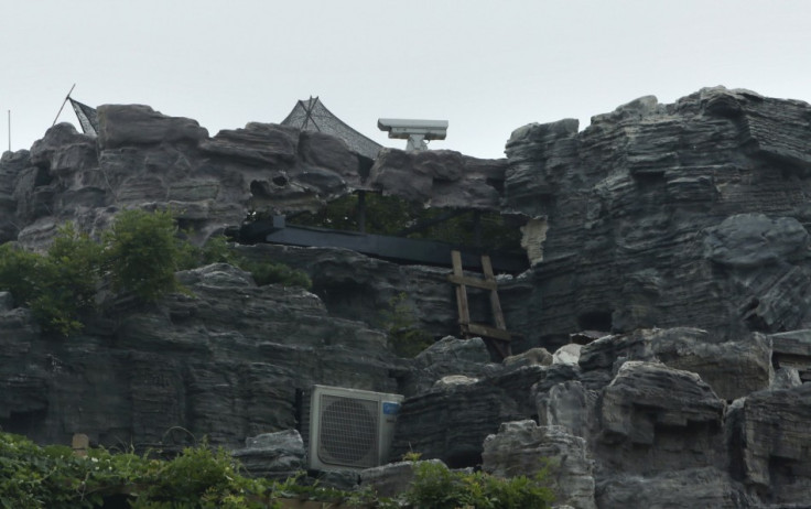 A surveillance camera is seen on the top of the rock villa. Residents in the building complained about the villa, fearing its weight may cause structural collapse. (Photo: Reuters)