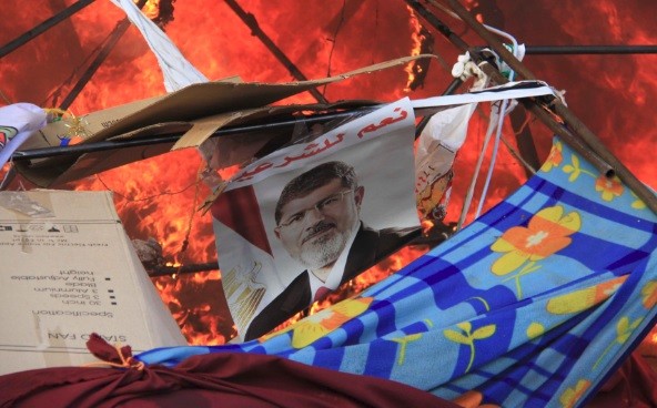 Western corporations Shell, GM and Electrolux pull out staff, shut offices and halt production in Egypt following the Egypt Morsi crackdown (Photo: Reuters)