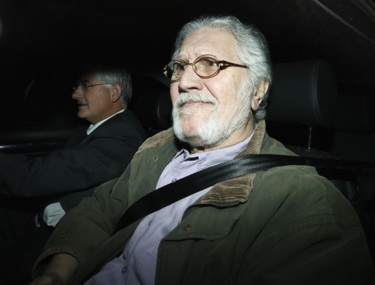 Dave Lee Travis returns to his house following his arrest in November (Reuters)
