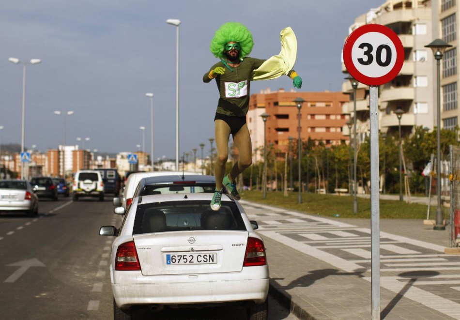 Man jumps onto car of wife's lingerie thief; holds on for 2.5 kilometers/Reuters Man jumps onto car of wife's lingerie thief; holds on for 2.5 kilometers/Reuters