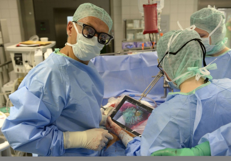 Professor Karl Oldhafer poses during liver iPad-aided surgery in Germany. (Photo: REUTERS/Fabian Bimmer)